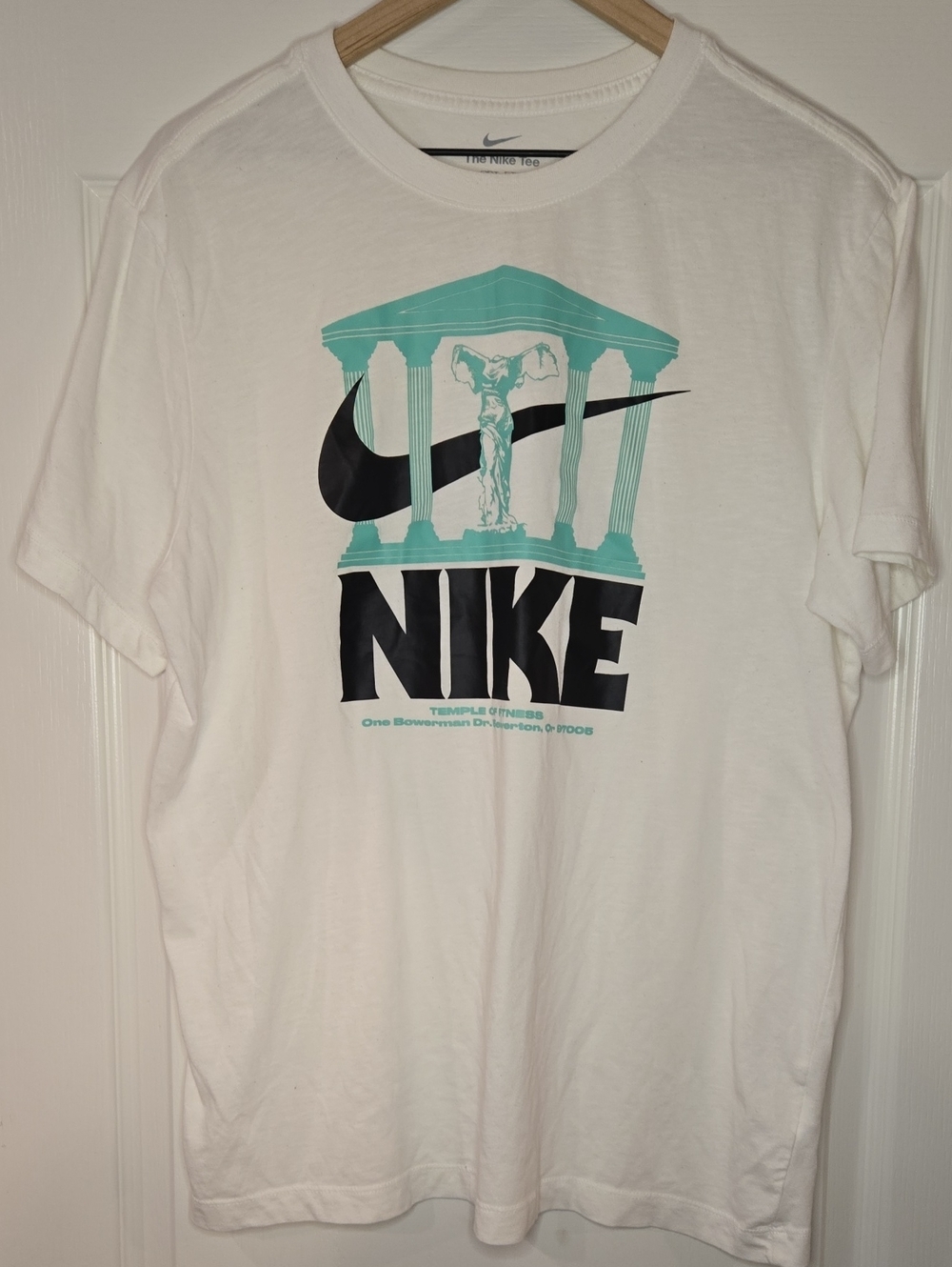Nike White Short Sleeve Tee with Black Logo and Teal Temple Graphic